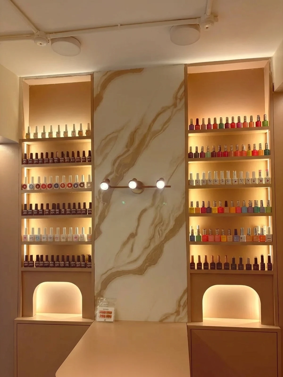 Boutique illuminated nail bar and gel extensions lounge at Angel Salon Mumbai