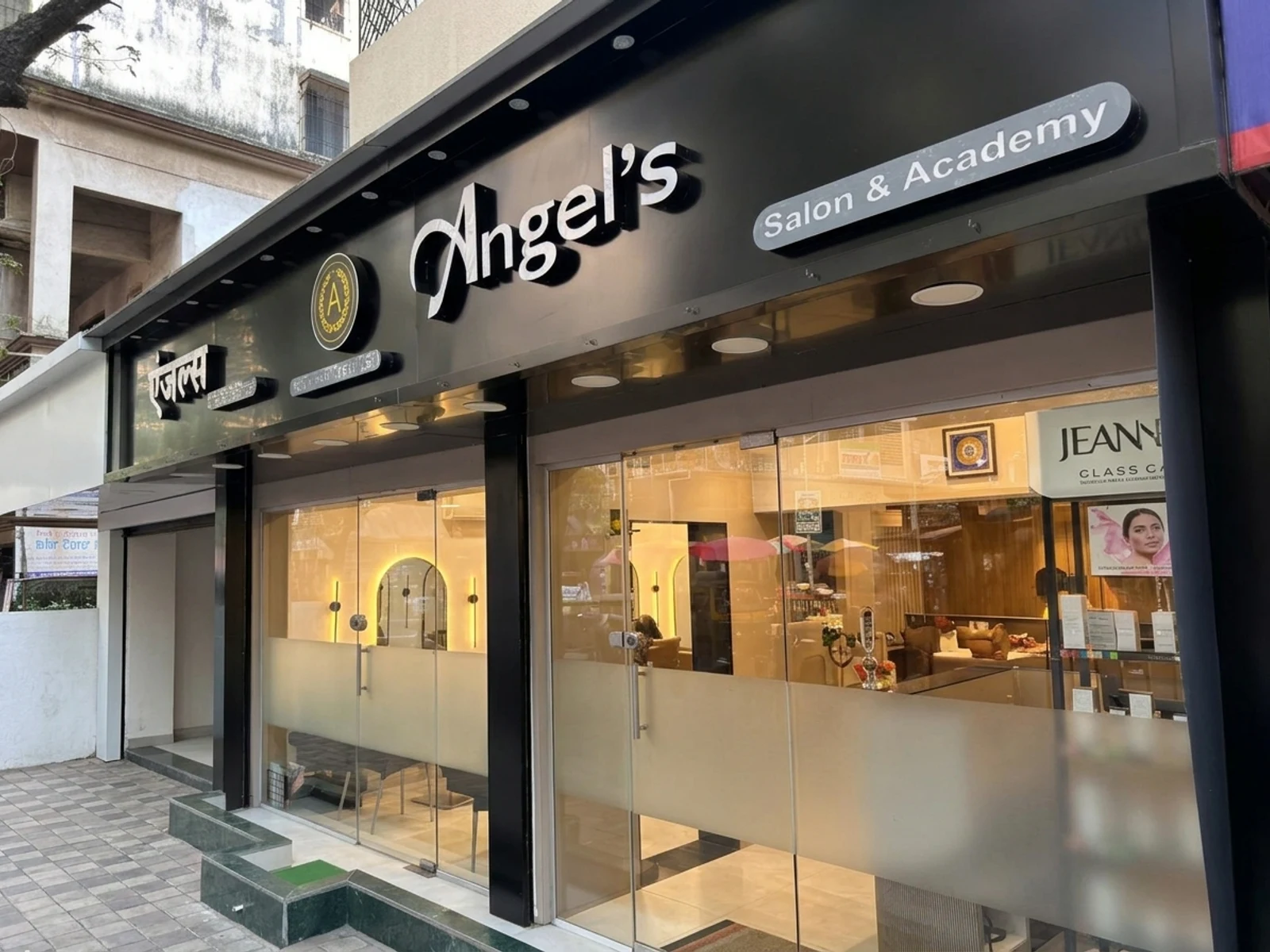 Angel Salon & Academy 3D gold illuminated academy signage and boutique exterior